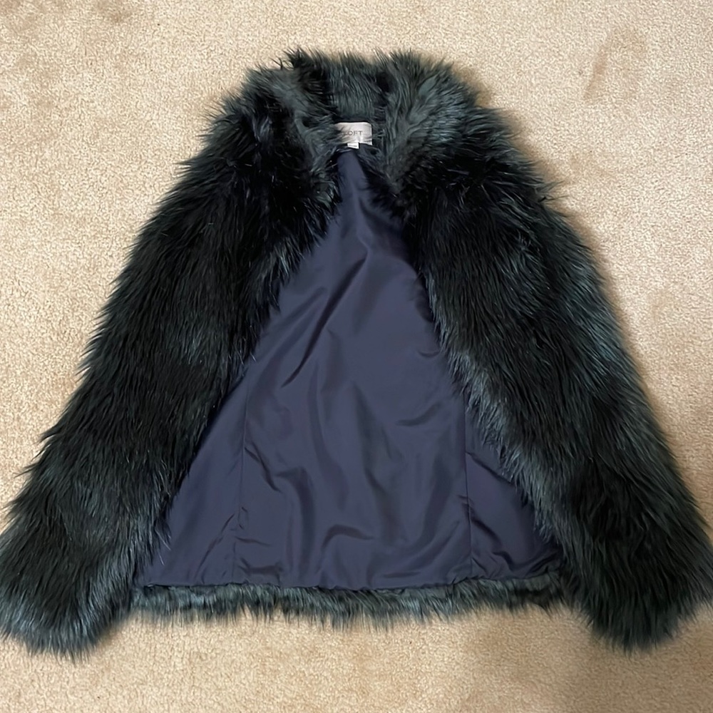 Black faux fur Loft vest. Never worn.